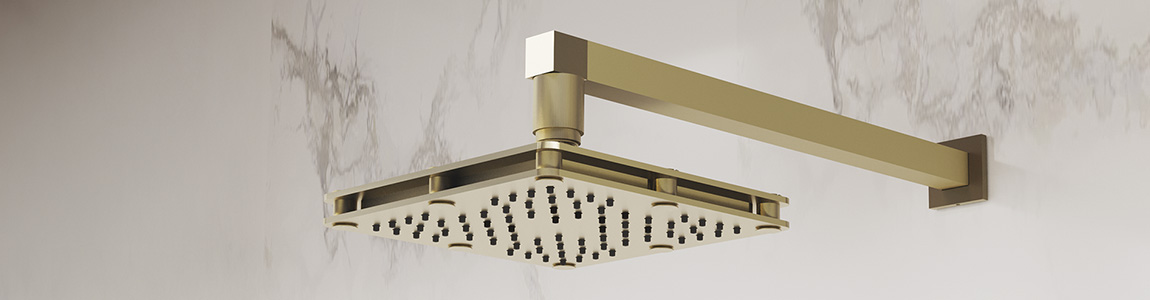 Regadera de baño lujoso cuadrada dorada H-3006 de Helvex, con una pared en colores claros